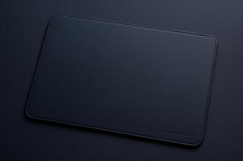 Vegan leather desk mat with stitched edges