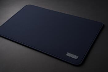 Washable fabric desk mat on a light table
