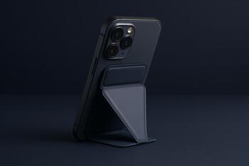 Magnetic foldable phone stand attached to case